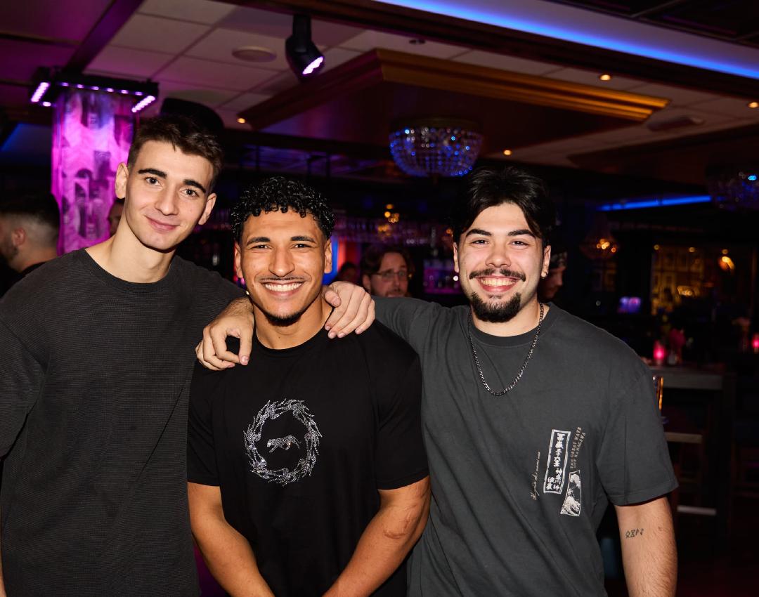 Three international professionals at a Technix social evening